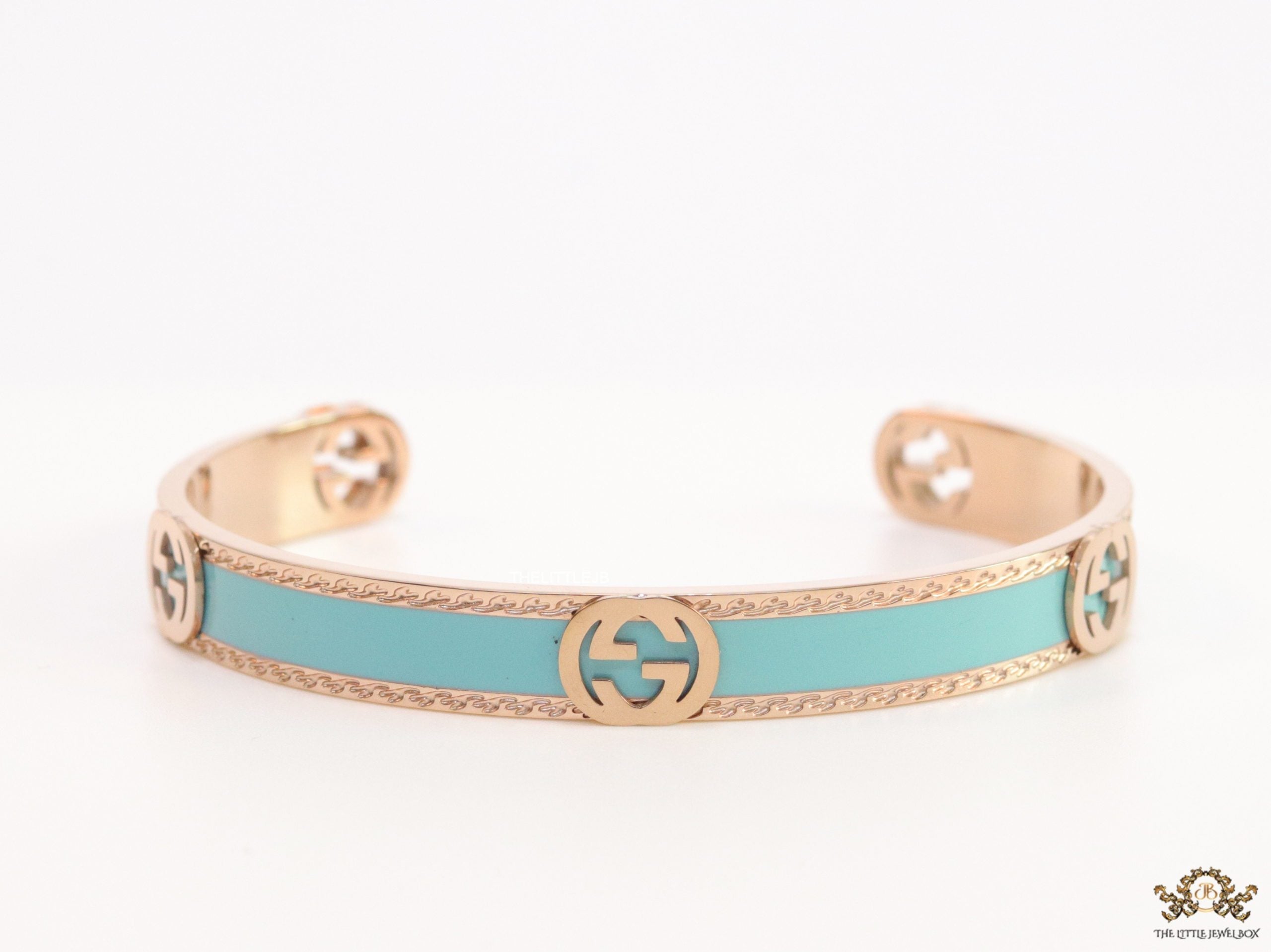 Blue and Rose gold open band bracelet with twin G alphabet motifs