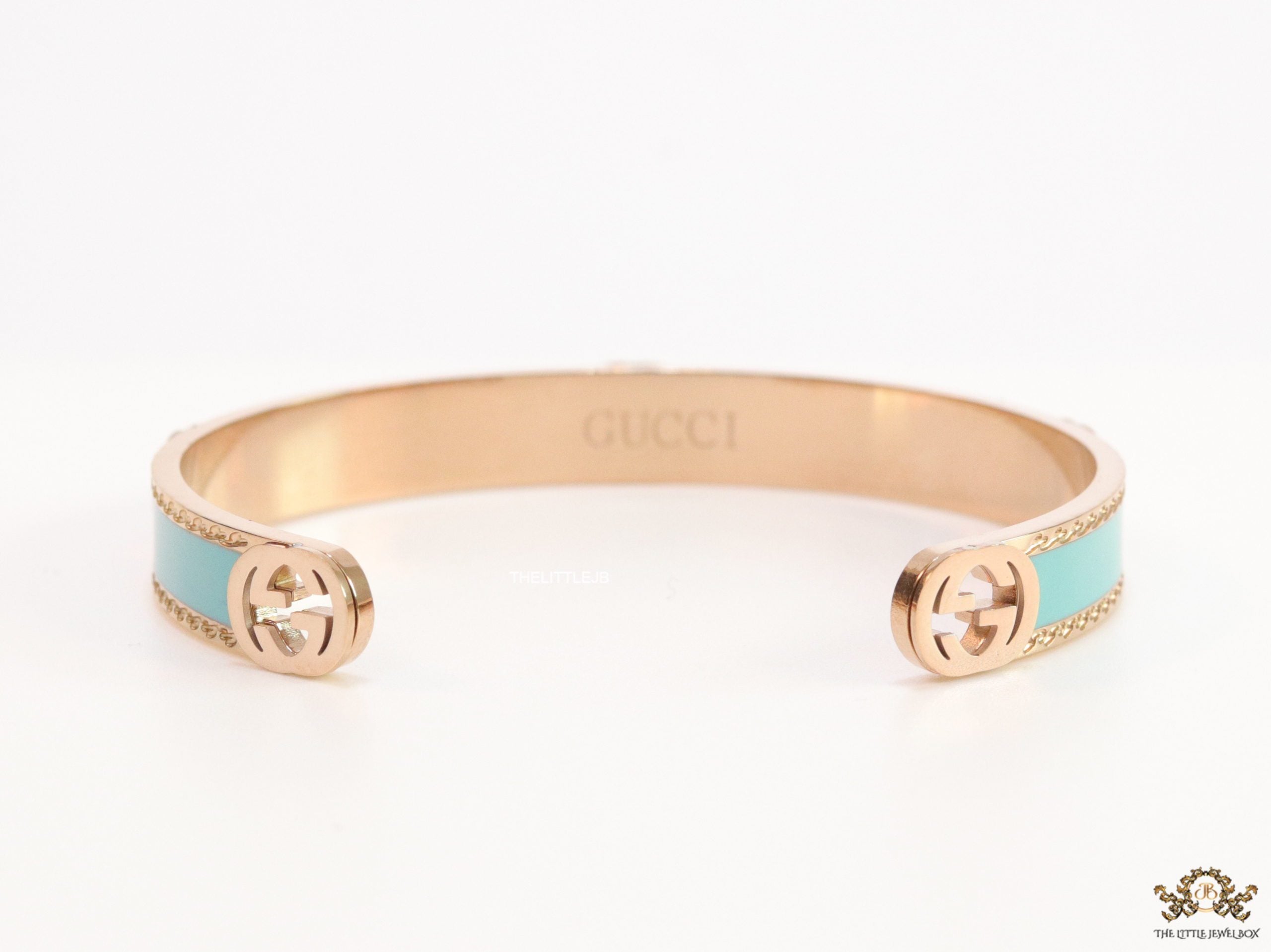 Blue and Rose gold open band bracelet with twin G alphabet motifs