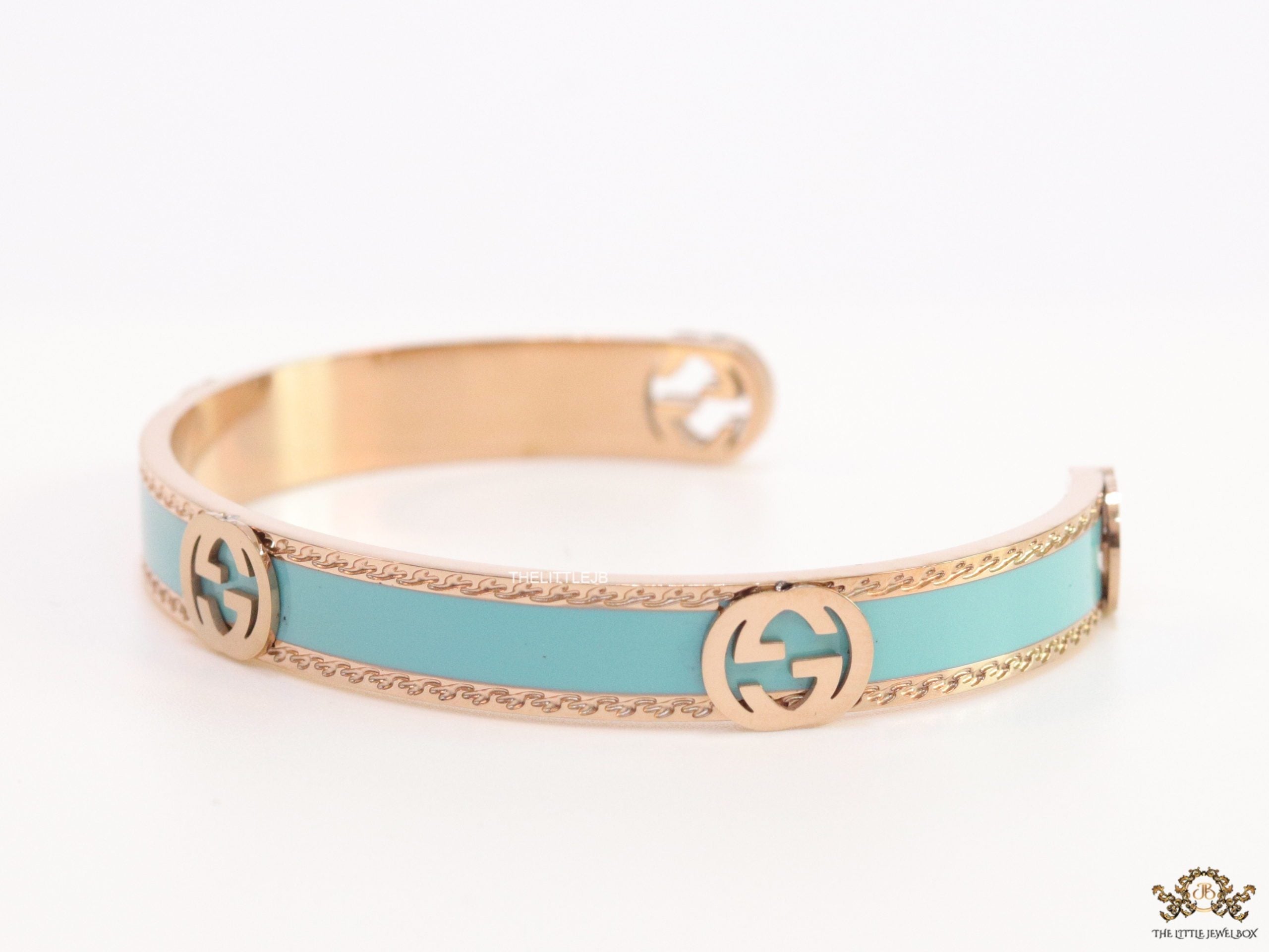 Blue and Rose gold open band bracelet with twin G alphabet motifs
