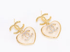 Double C on dangling cream heart gold earrings with CZ