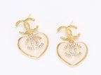 Double C on dangling cream heart gold earrings with CZ