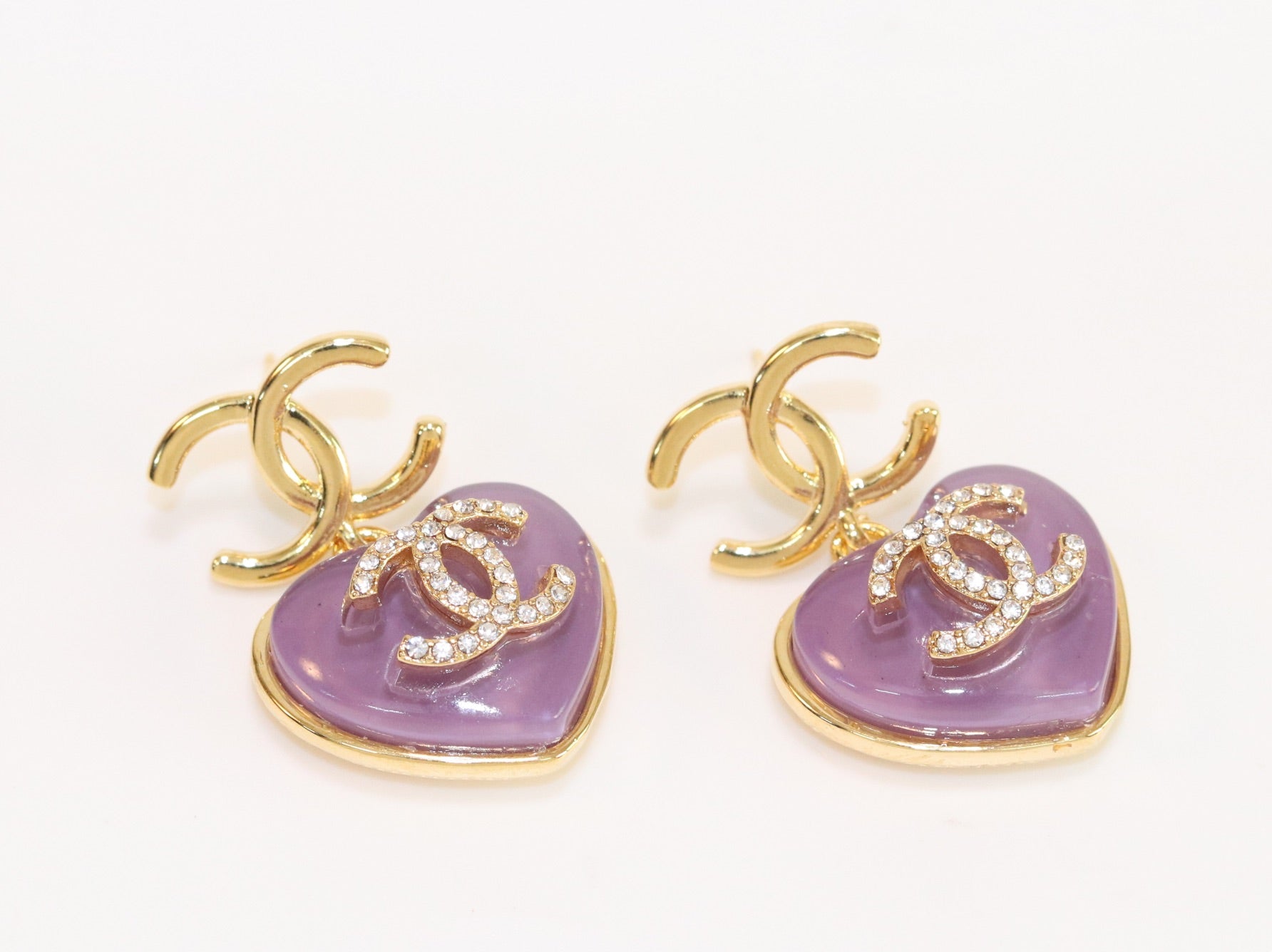 Double C on dangling purple heart gold earrings with CZ