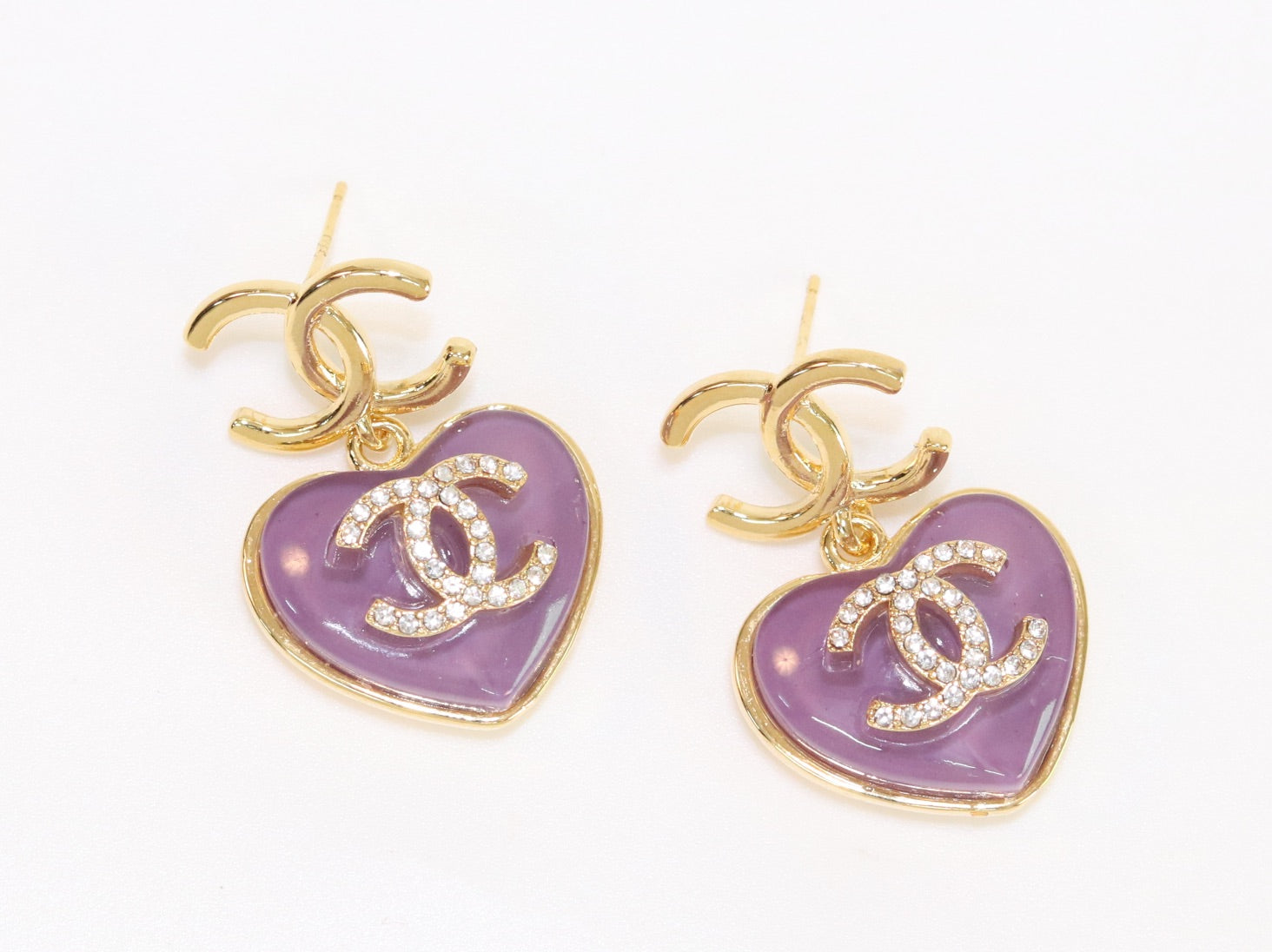 Double C on dangling purple heart gold earrings with CZ