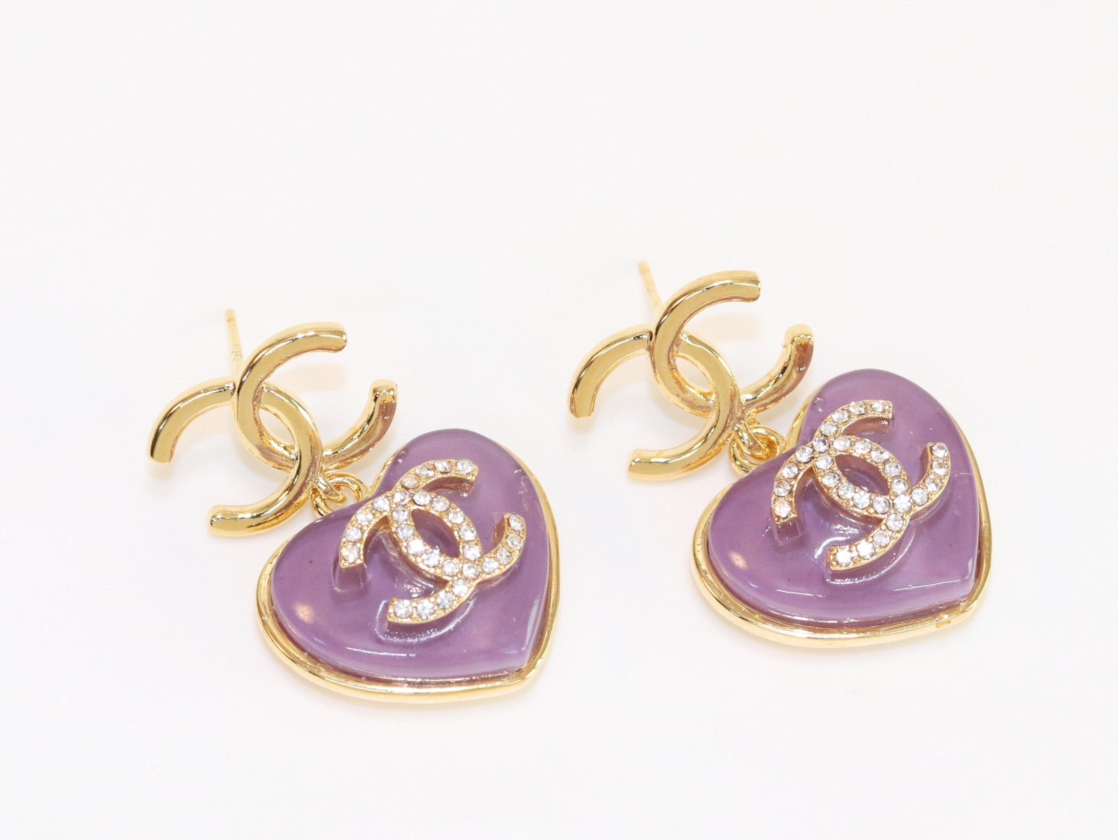 Double C on dangling purple heart gold earrings with CZ