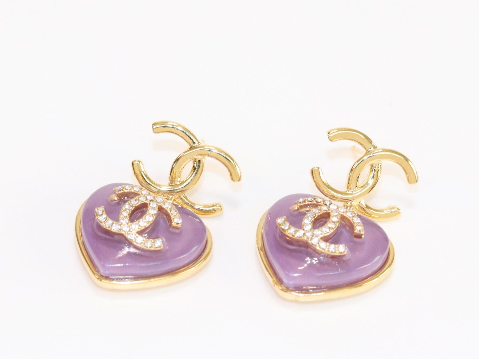 Double C on dangling purple heart gold earrings with CZ