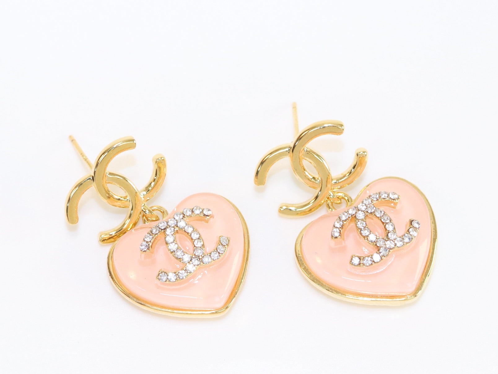 Double C on dangling pink heart gold earrings with CZ
