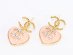 Double C on dangling pink heart gold earrings with CZ
