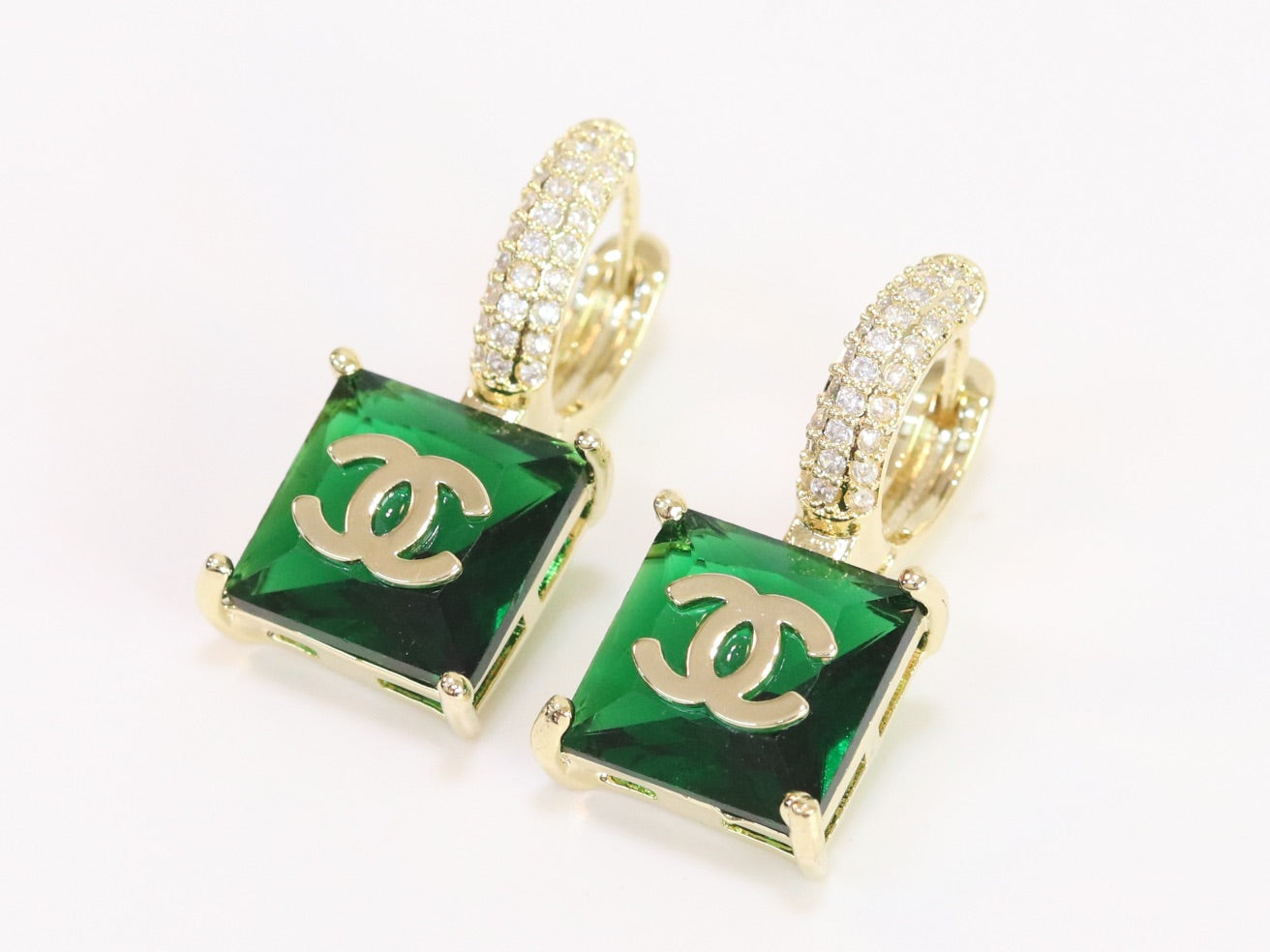 Double C on dangling green square gold earrings with CZ