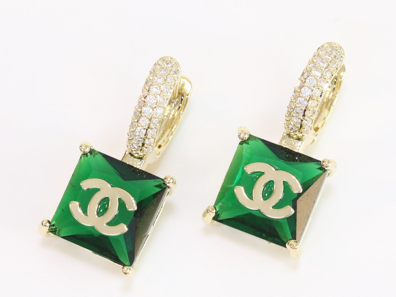 Double C on dangling green square gold earrings with CZ