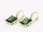 Double C on dangling green square gold earrings with CZ
