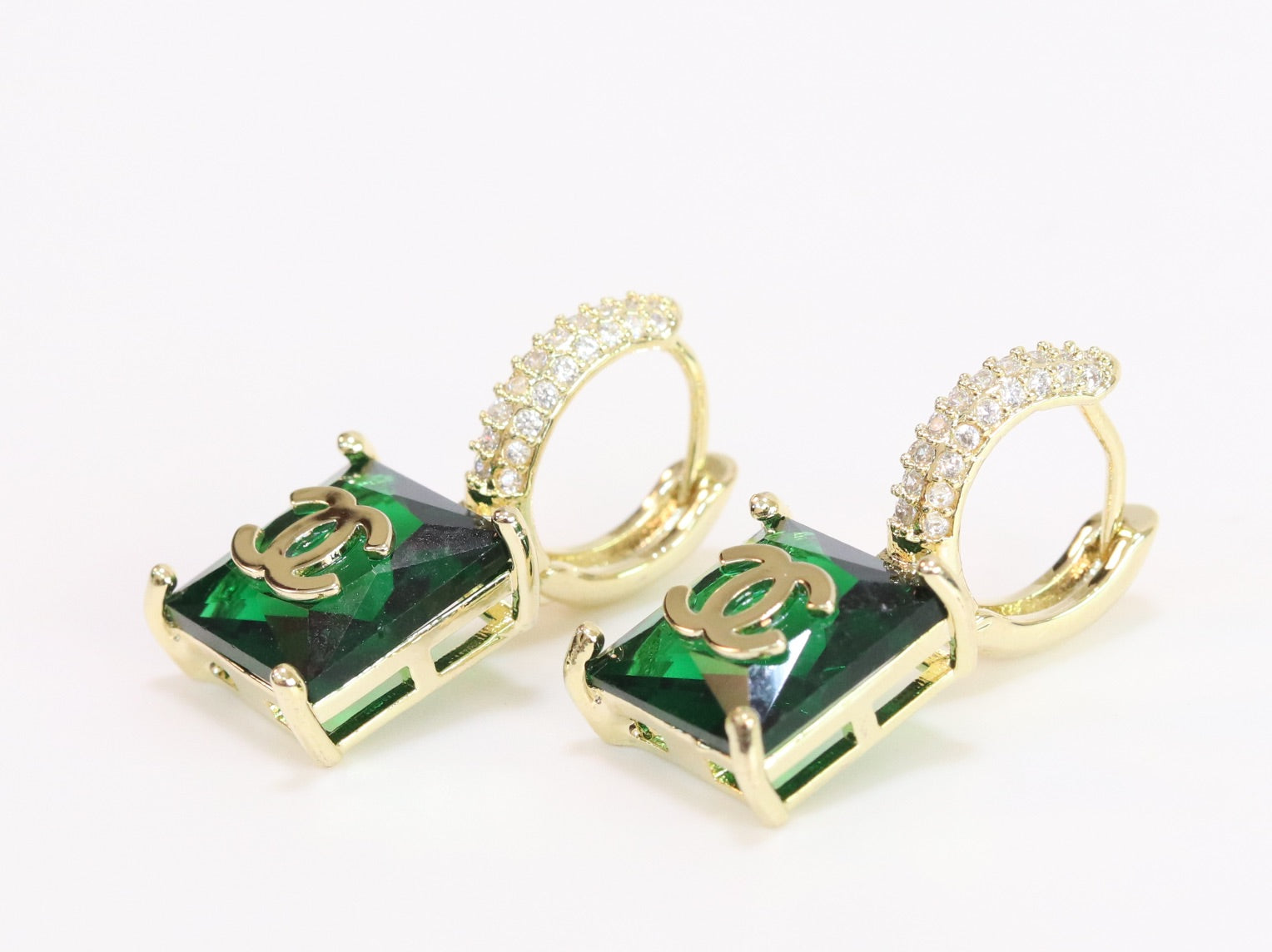 Double C on dangling green square gold earrings with CZ
