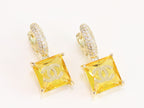 Double C on dangling yellow square gold earrings with CZ