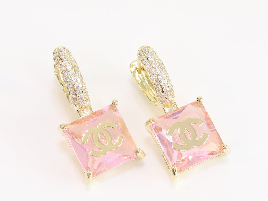 Double C on dangling pink square gold earrings with CZ