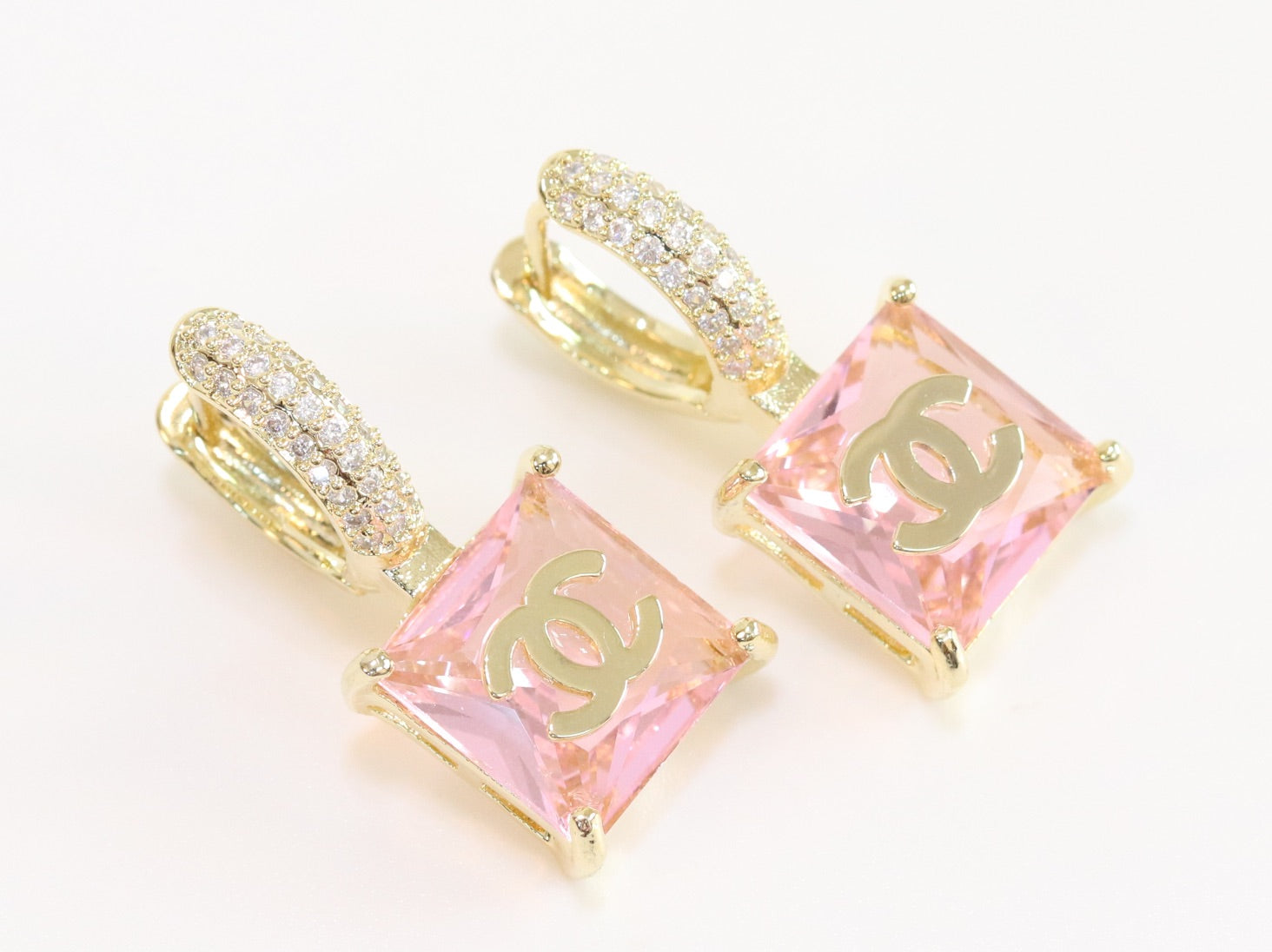 Double C on dangling pink square gold earrings with CZ