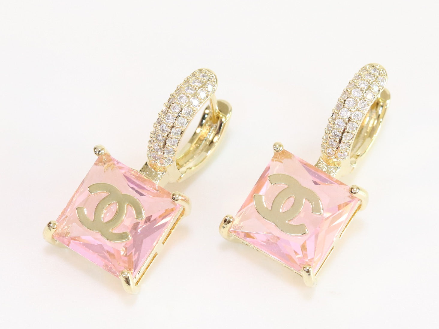 Double C on dangling pink square gold earrings with CZ
