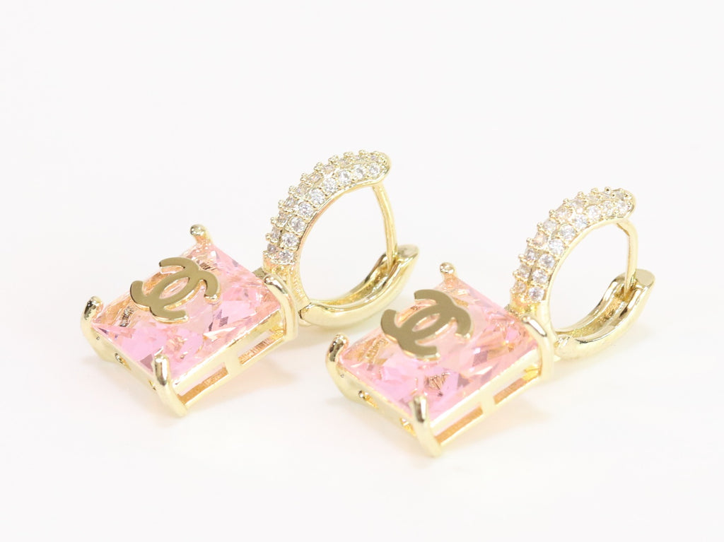 Double C on dangling pink square gold earrings with CZ