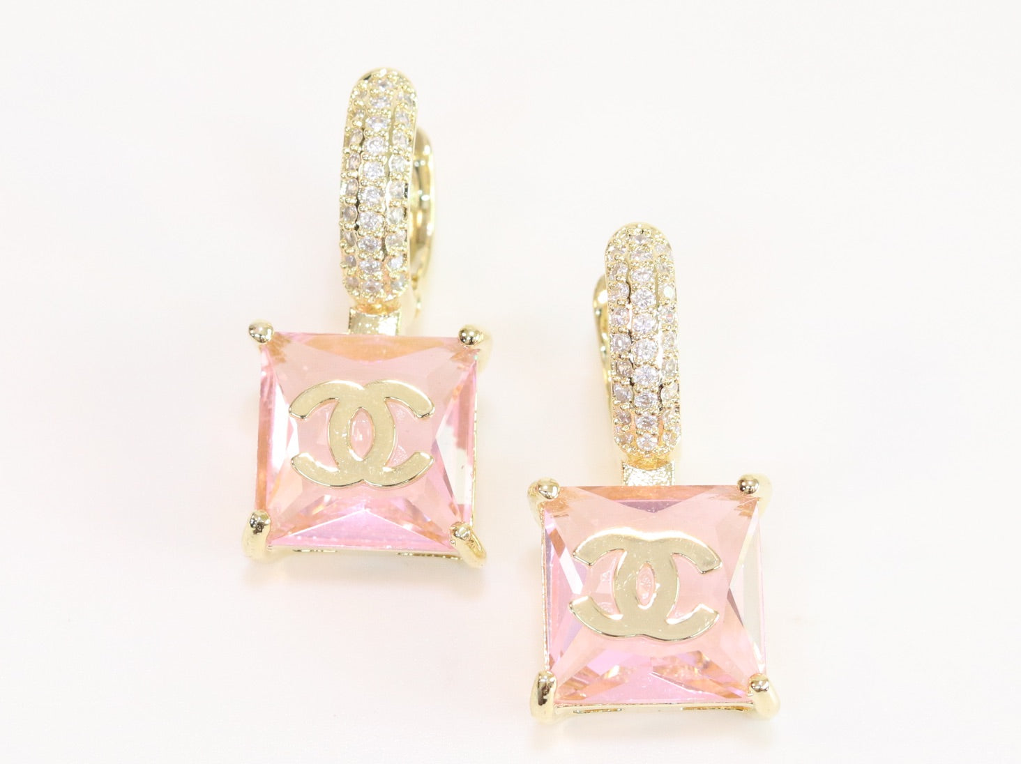 Double C on dangling pink square gold earrings with CZ