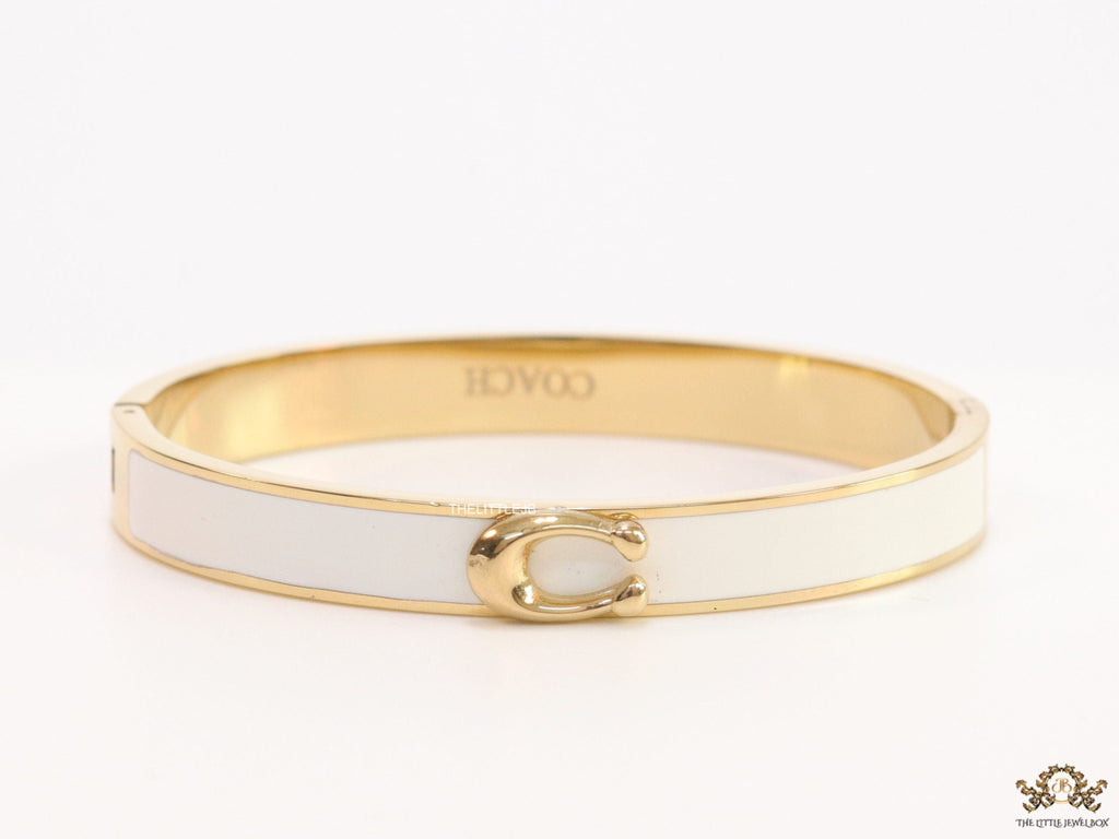 Sleek white and golden bracelet with C alphabet in centre