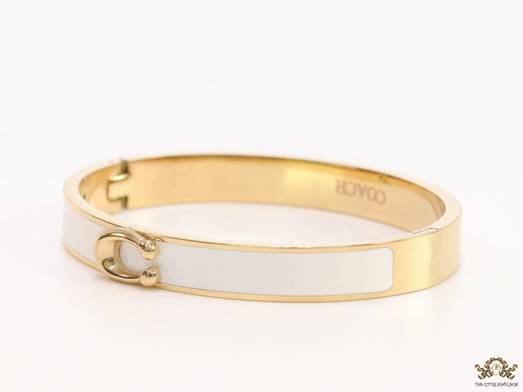 Sleek white and golden bracelet with C alphabet in centre