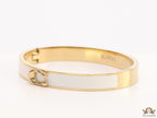 Sleek white and golden bracelet with C alphabet in centre