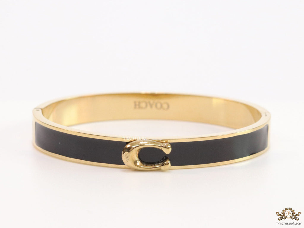 Sleek black and golden bracelet with C alphabet in centre
