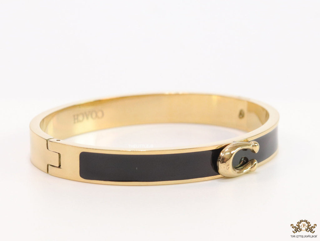 Sleek black and golden bracelet with C alphabet in centre