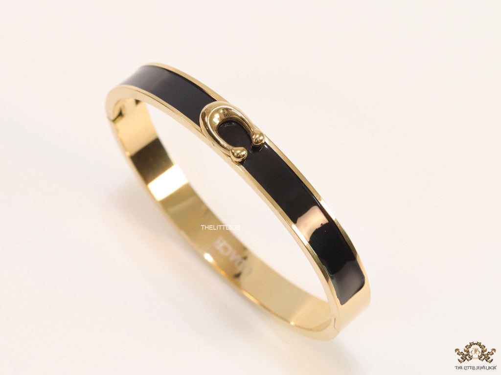 Sleek black and golden bracelet with C alphabet in centre