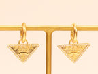 Gold Dangling Triangle earrings on small hoops with CZ