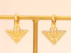 Gold Dangling Triangle earrings on small hoops with CZ