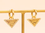 Gold Dangling Triangle earrings on small hoops with CZ
