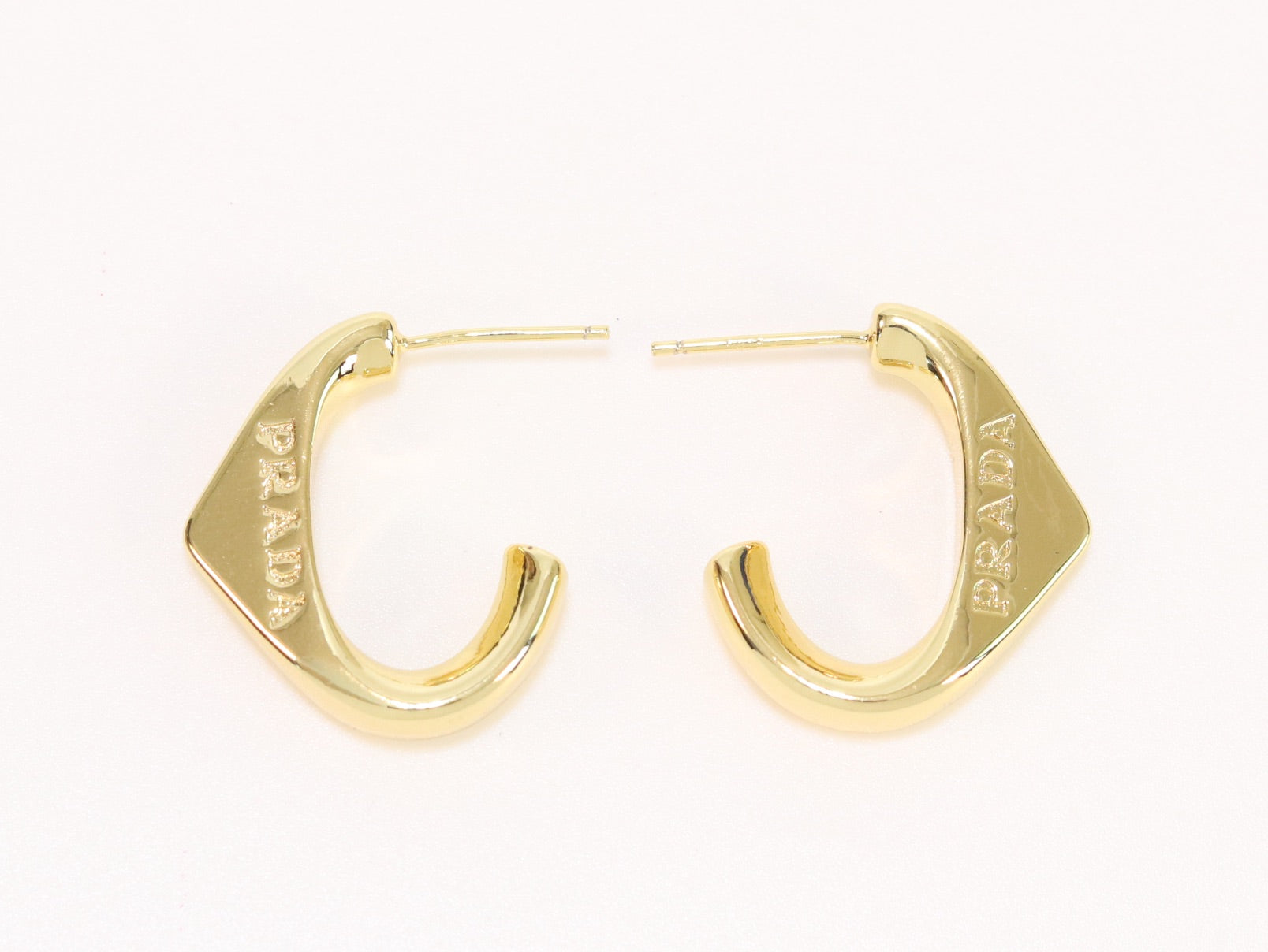 Gold open designer hoops