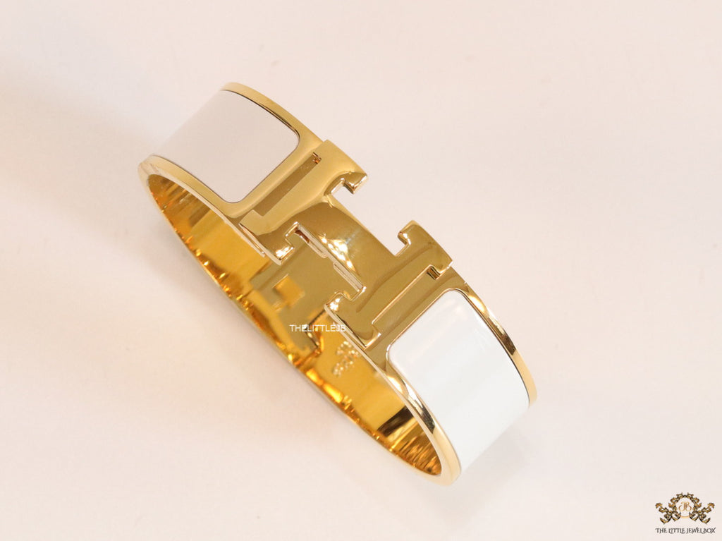 Openable H motif white 18mm bracelet in a shiny gold plating
