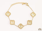 Gold plated chain bracelet with flower motifs