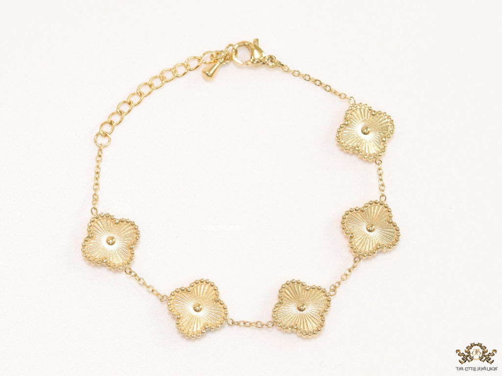 Gold plated chain bracelet with flower motifs
