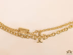 Gold plated two layered link chain bracelet with T motif