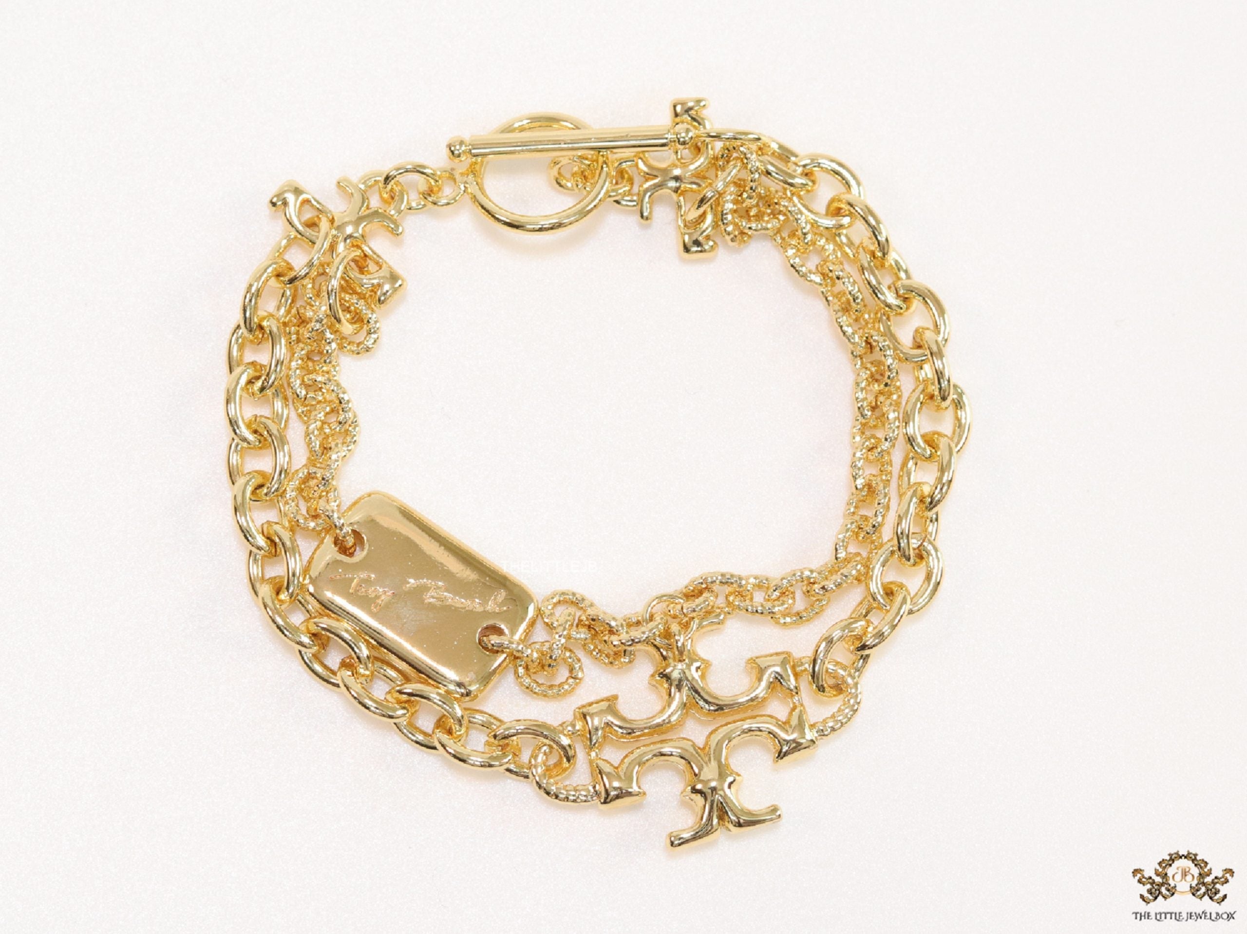 Gold plated two layered link chain bracelet with T motif