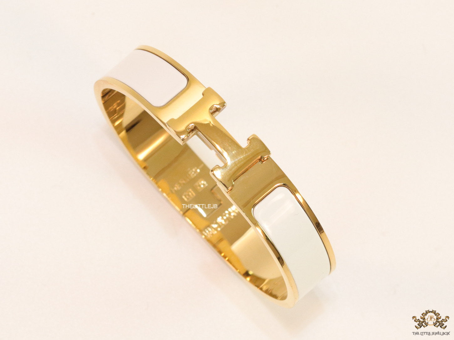 Alphabet H white 12 mm bracelet in gold