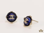 Royal blue studs with double C in centre