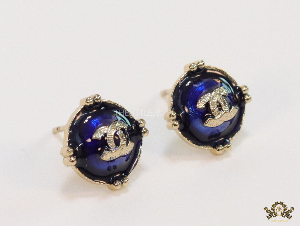 Royal blue studs with double C in centre