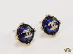 Royal blue studs with double C in centre