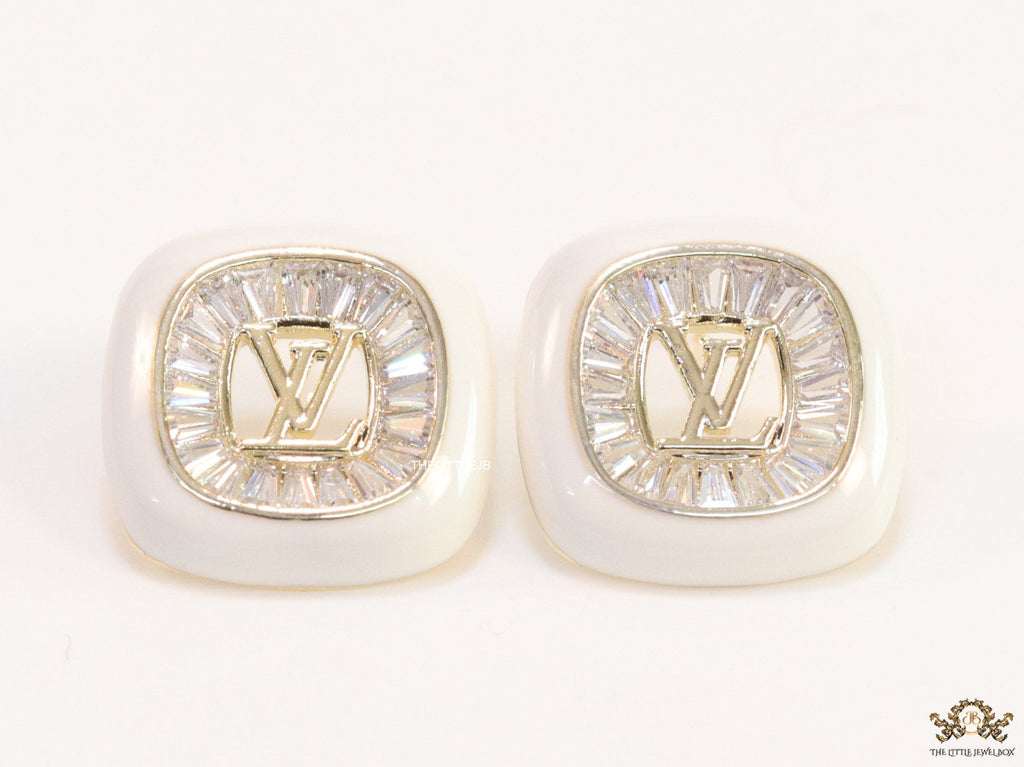 Golden and white square studs with alphabets and cz baguettes