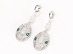 Platinum Snake head pendant set with emerald detailing