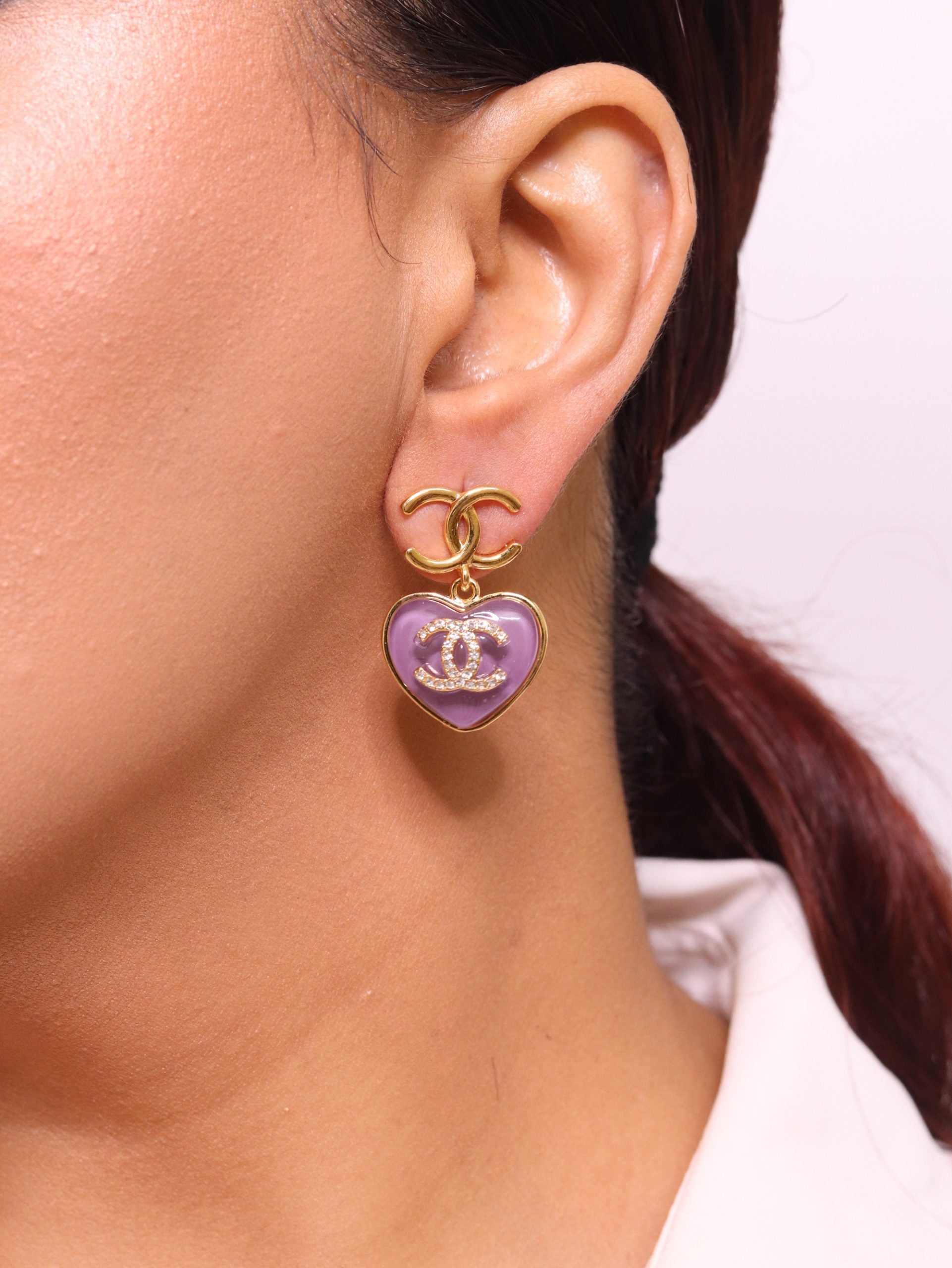 Double C on dangling purple heart gold earrings with CZ
