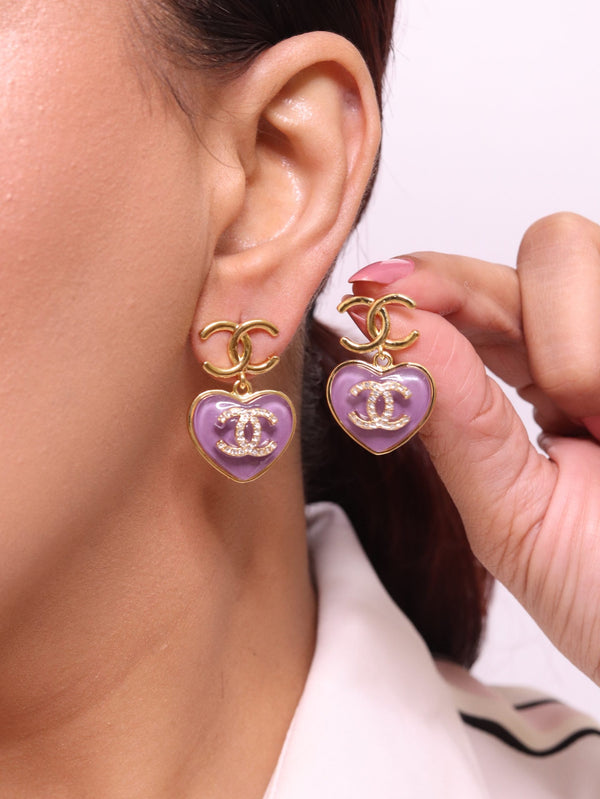 Double C on dangling purple heart gold earrings with CZ