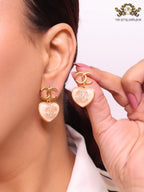 Double C on dangling cream heart gold earrings with CZ