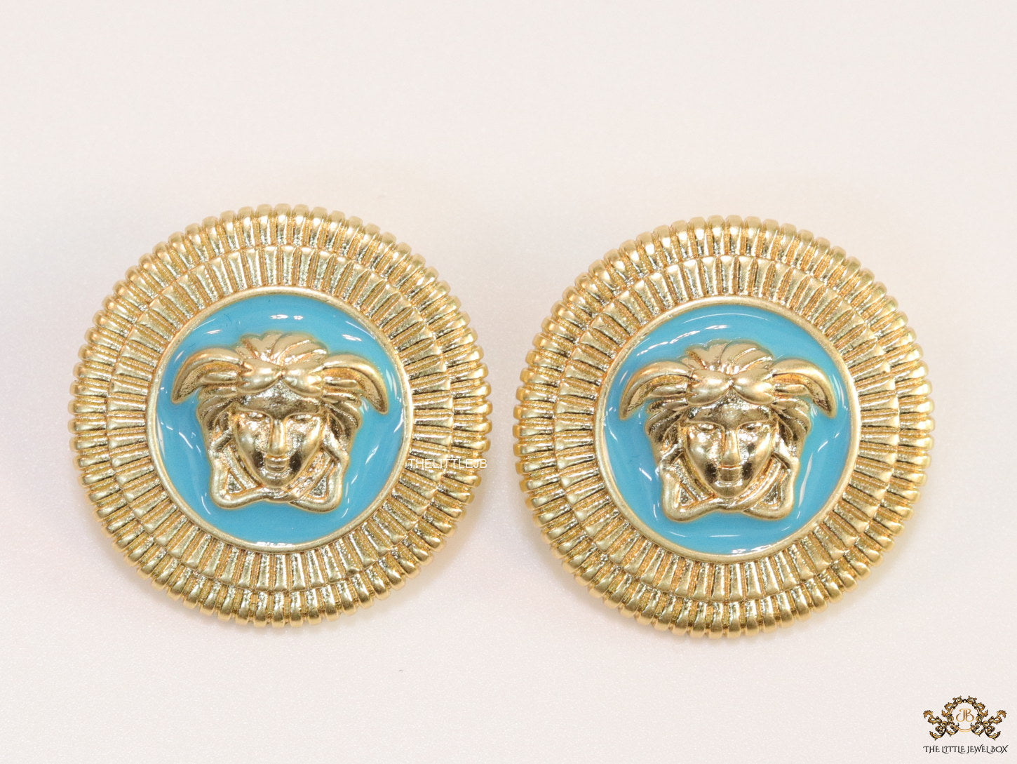 Blue and golden round Medusa stud earrings