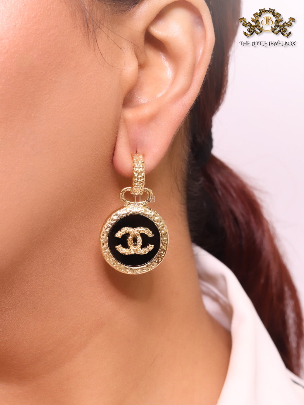 Double C on black enamel hanging gold earrings with CZ
