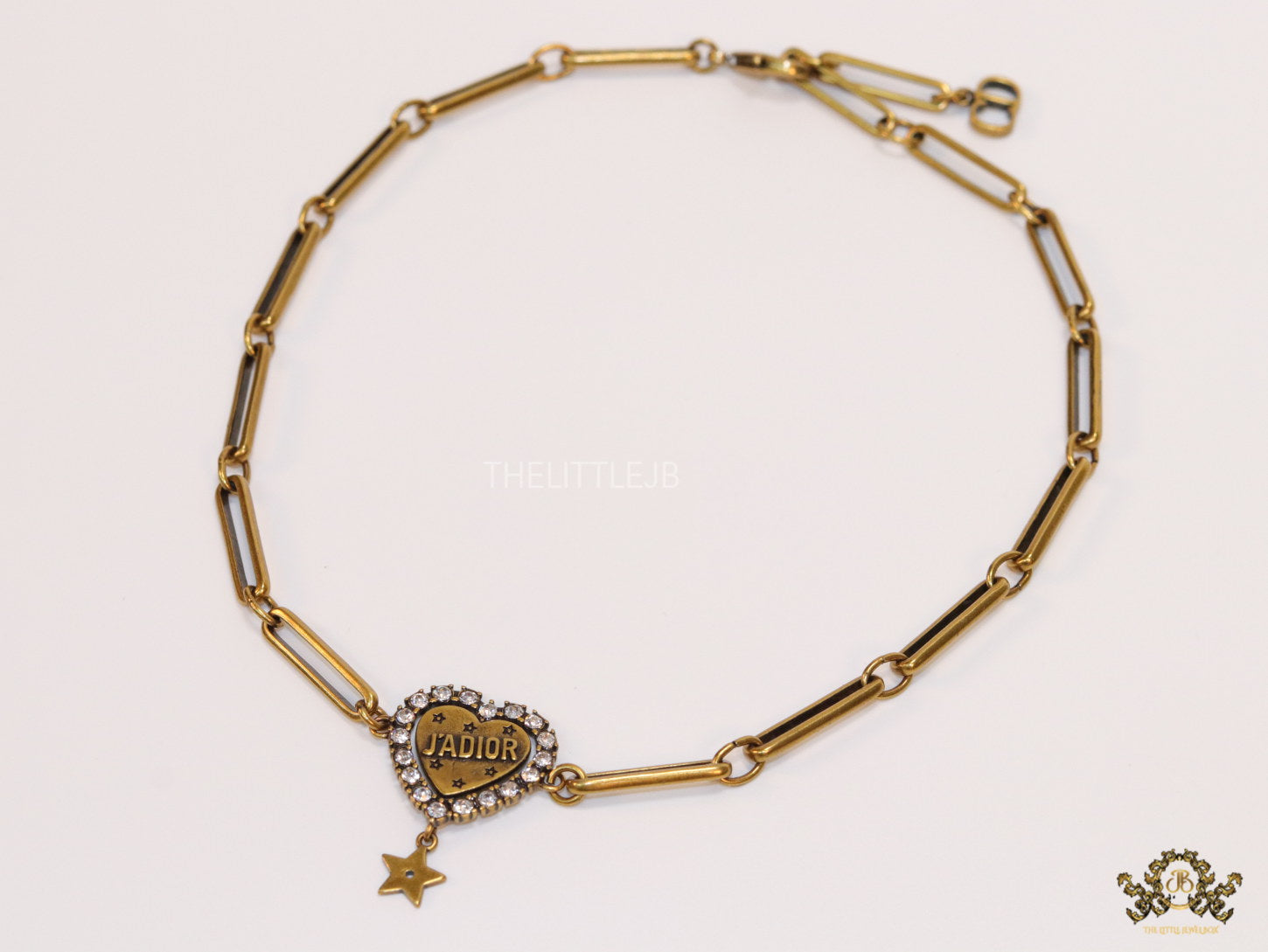 Gold plated link chain necklace with heart shaped alphabet pendant