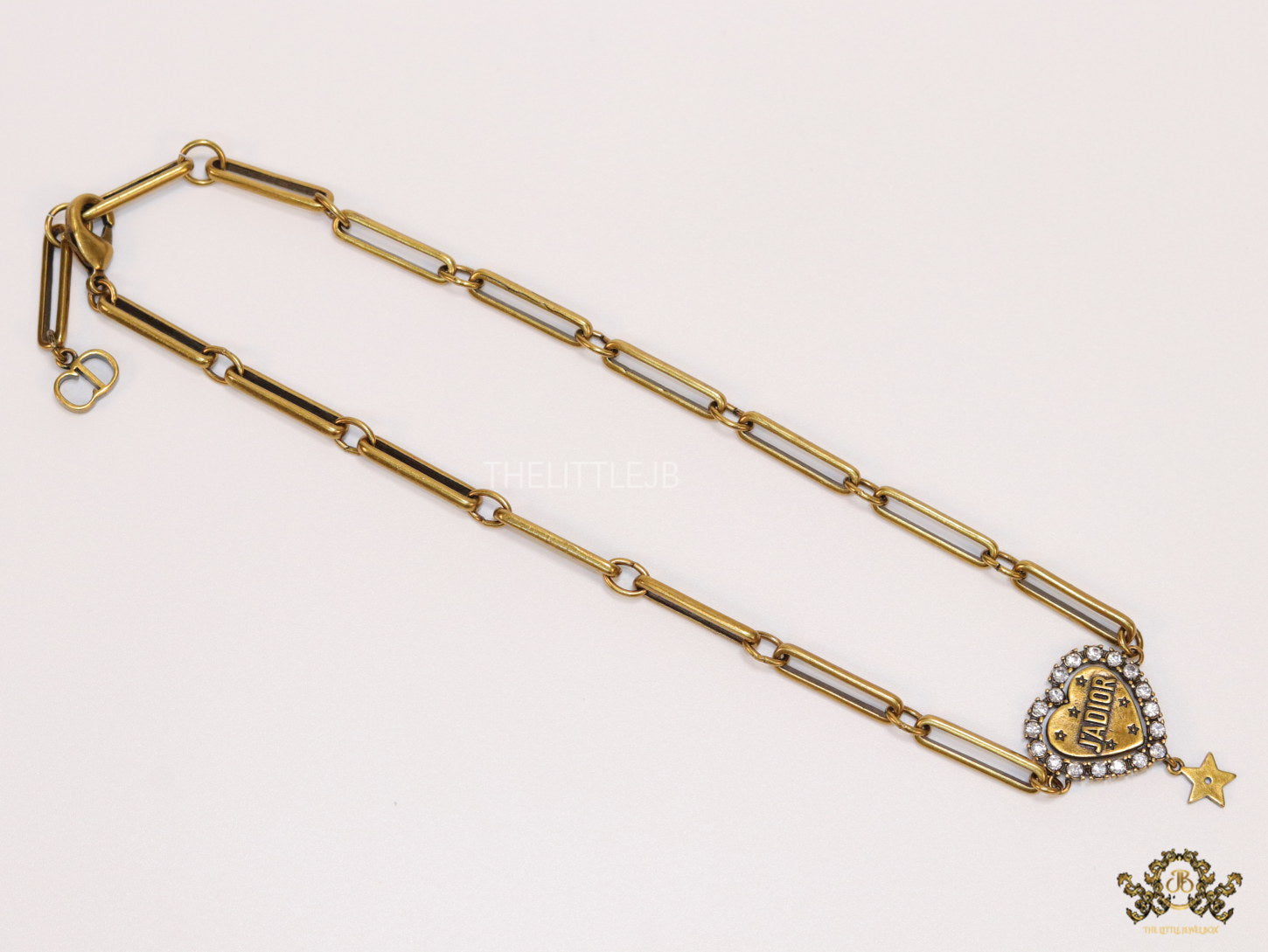 Gold plated link chain necklace with heart shaped alphabet pendant