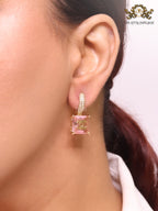 Double C on dangling pink square gold earrings with CZ